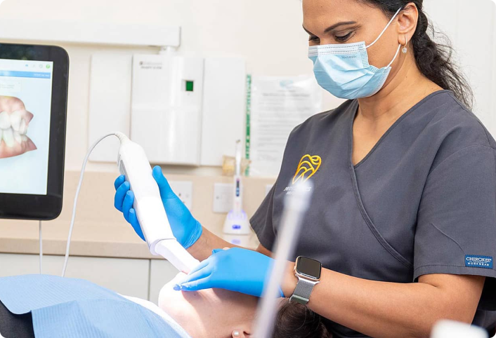 Providence Dental clinician taking a 3D digital scan of a patient
