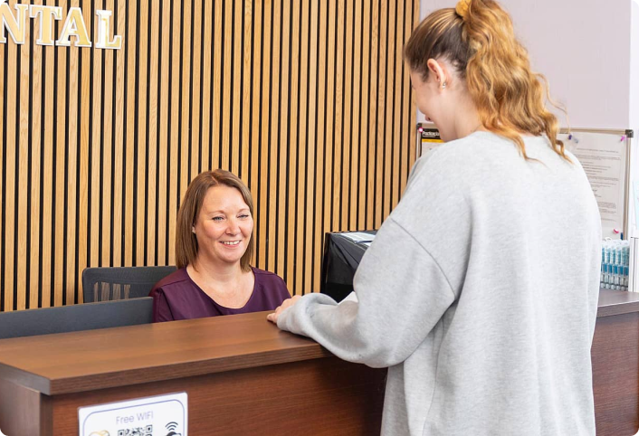 Welcoming reception desk at Providence Dental